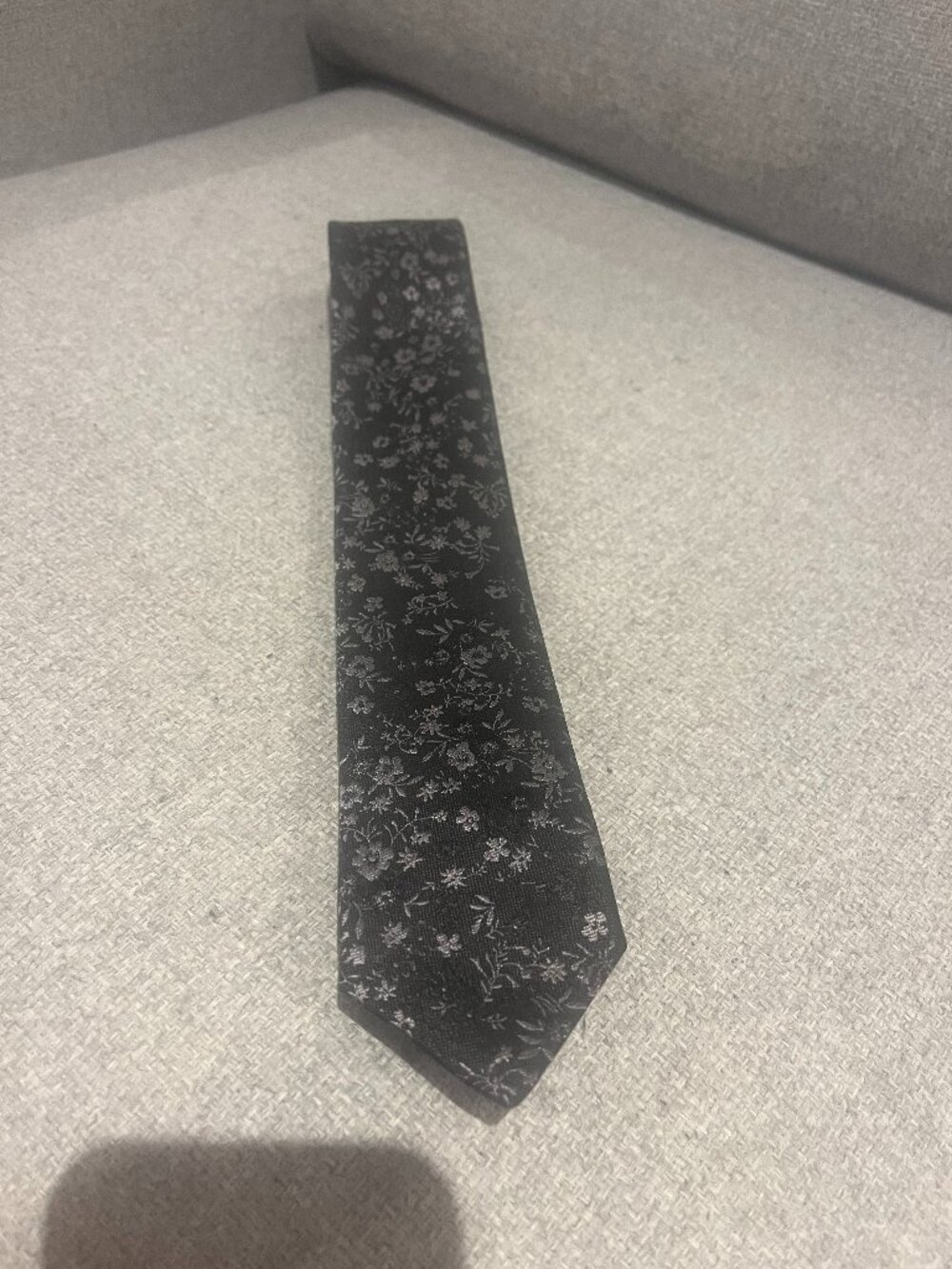 Men's Silk Tie. Brand: OLYMP. Black with grey flowers. NEW. Retail:$79+tax.